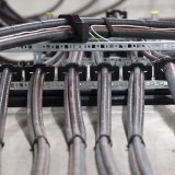 Le groupe installera de nouveaux postes de couplage isolés au gaz de 132 kilovolts (kV) et 16 kV, ainsi qu'un nouveau transformateur de 132/50 kV. (KEYSTONE/Peter Schneider) KEYSTONE/PETER SCHNEIDER